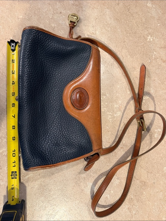Dooney & Bourke Handbags - Vintage Dooney & Bourke dark Navy Pebbled Leather Crossbody with Brown Trim